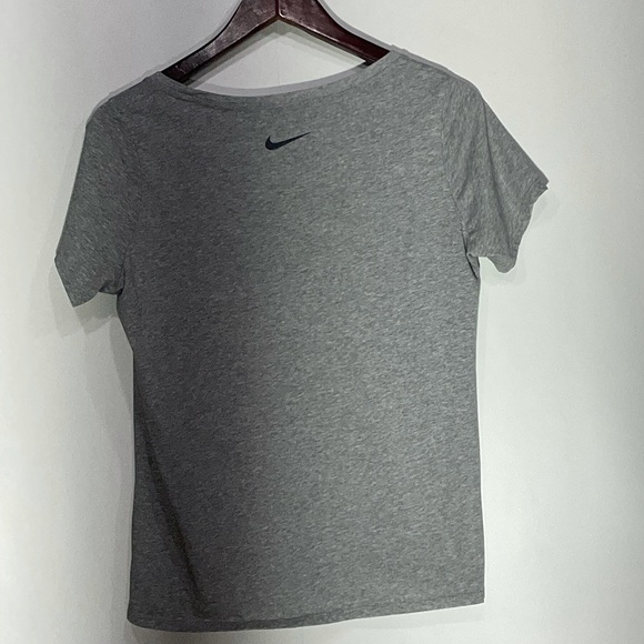 The Nike Tee Athletic Cut Dri-Fit short sleeve round neck ‘Nike’ logo t-shirt - Picture 7 of 9